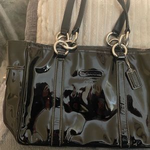 Patent leather Coach handbag like new zipper top inside pockets and Coach fob